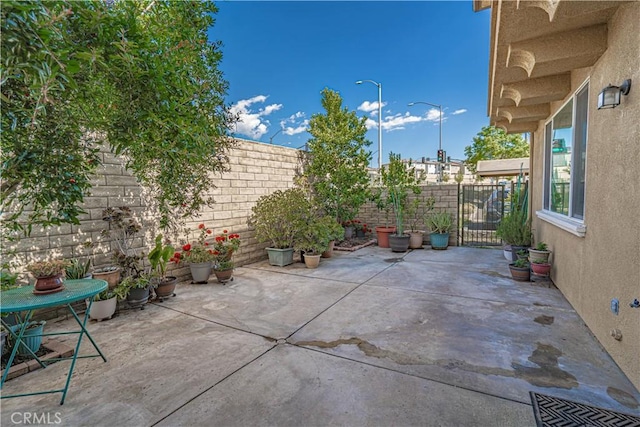 view of patio with a fenced backyard