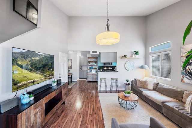 4658 Ohio St, San Diego, CA 92116 - living room featuring a high ceiling and dark wood finished floors