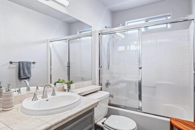 4658 Ohio St, San Diego, CA 92116 - full bath with vanity, toilet, and shower / bath combination with glass door