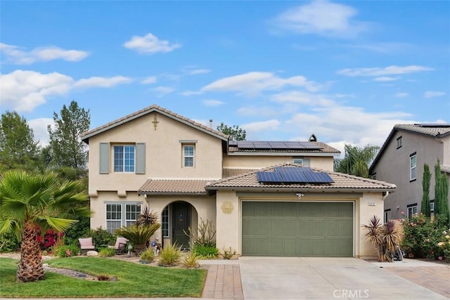 34787 Grotto Hills Dr, Winchester, CA 92596 - mediterranean / spanish-style house with a tile roof, a garage, stucco siding, concrete driveway, and solar panels
