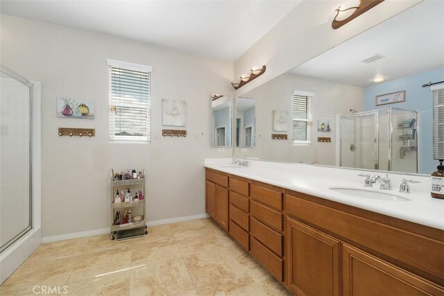 34787 Grotto Hills Dr, Winchester, CA 92596 - full bath with visible vents, double vanity, a sink, and a stall shower