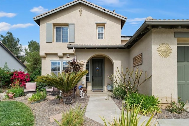 34787 Grotto Hills Dr, Winchester, CA 92596 - entrance to property with a tile roof and stucco siding