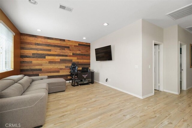 34787 Grotto Hills Dr, Winchester, CA 92596 - living room with recessed lighting, light wood finished floors, wooden walls, and visible vents