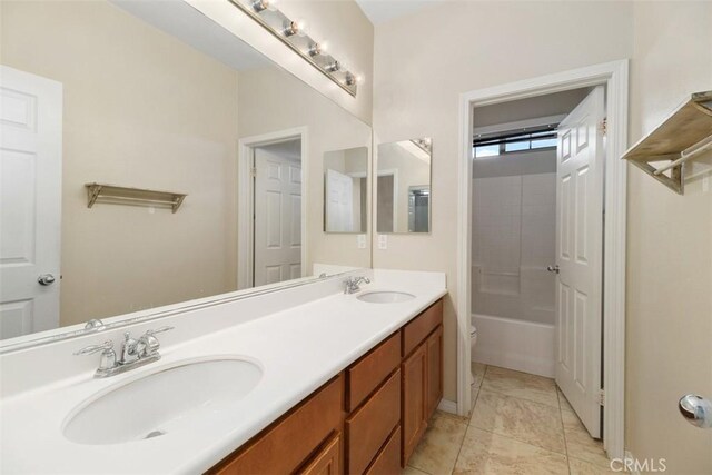 34787 Grotto Hills Dr, Winchester, CA 92596 - bathroom featuring a sink, toilet, double vanity, and a bathtub