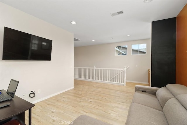 34787 Grotto Hills Dr, Winchester, CA 92596 - living area featuring recessed lighting, baseboards, visible vents, and wood finished floors