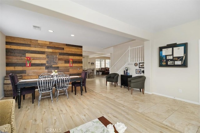 34787 Grotto Hills Dr, Winchester, CA 92596 - dining space with visible vents, wood finished floors, stairway, wooden walls, and recessed lighting