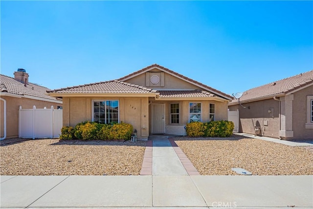 749 Cortez Dr, Hemet, CA 92545 - view of front of property featuring fence, stucco siding, and a tile roof