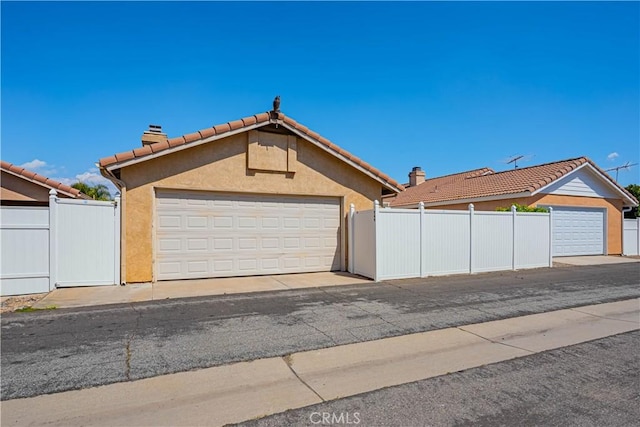 749 Cortez Dr, Hemet, CA 92545 - detached garage featuring fence