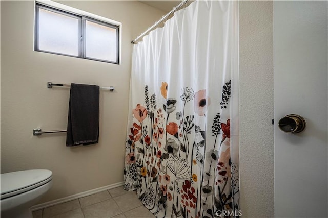 749 Cortez Dr, Hemet, CA 92545 - full bathroom featuring toilet, tile patterned floors, and a shower with shower curtain