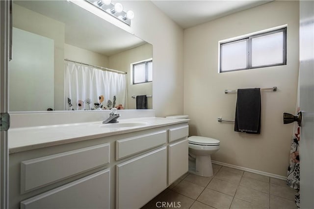 749 Cortez Dr, Hemet, CA 92545 - bathroom featuring baseboards, tile patterned flooring, vanity, and toilet