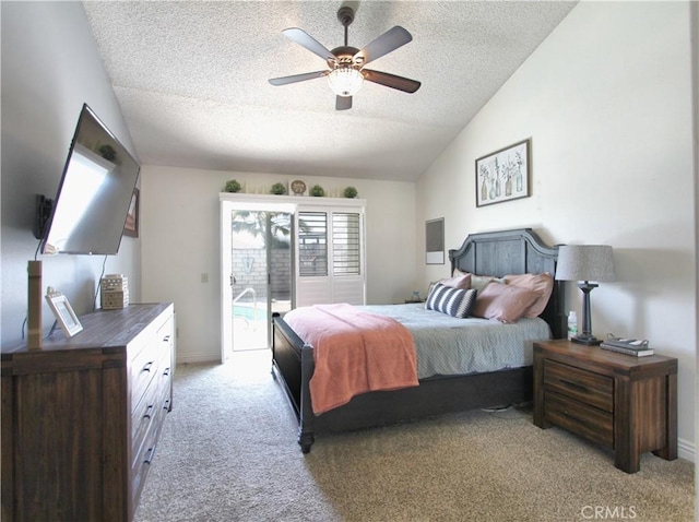 bedroom featuring lofted ceiling, light carpet, access to exterior, a textured ceiling, and a ceiling fan