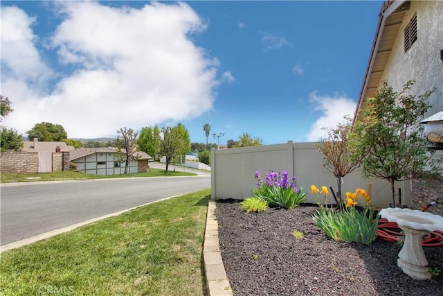 view of yard with fence