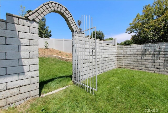 view of yard with a fenced backyard