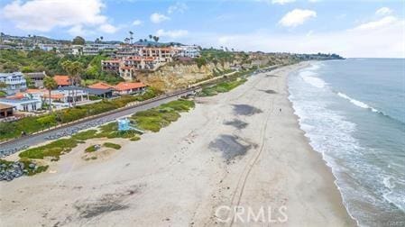 309 W Avenida Valencia, San Clemente, CA 92672 - drone / aerial view with a water view and a beach view
