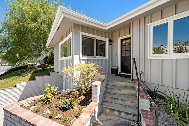 309 W Avenida Valencia, San Clemente, CA 92672 - doorway to property with board and batten siding