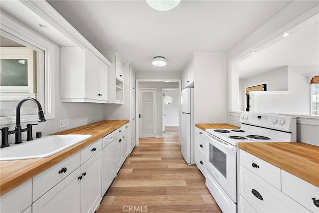 309 W Avenida Valencia, San Clemente, CA 92672 - kitchen with white appliances, a sink, and butcher block counters