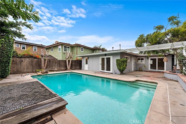 309 W Avenida Valencia, San Clemente, CA 92672 - view of pool featuring a fenced in pool, a fenced backyard, a patio area, and french doors