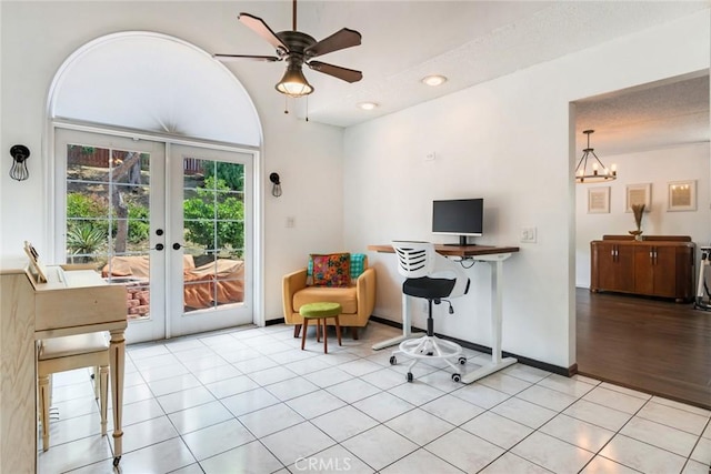 home office with ceiling fan with notable chandelier, french doors, recessed lighting, and light tile patterned flooring