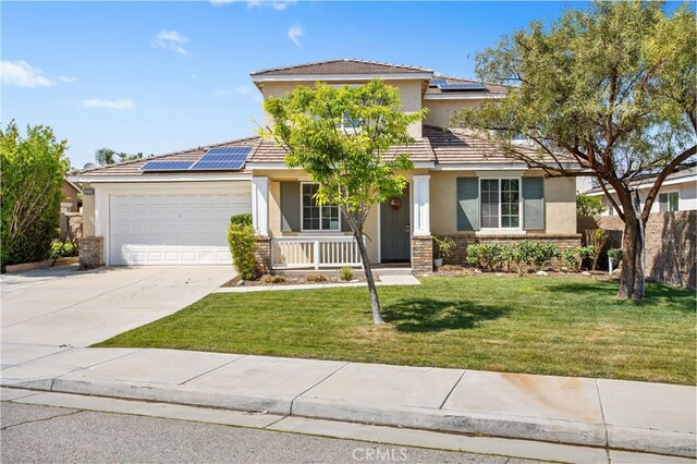 29040 Foghorn Ct, Menifee, CA 92585 - view of front facade featuring stucco siding, roof mounted solar panels, an attached garage, covered porch, and concrete driveway