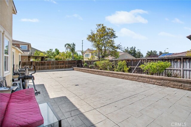 29040 Foghorn Ct, Menifee, CA 92585 - fenced backyard featuring a patio area