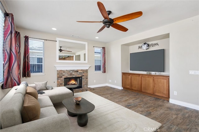 29040 Foghorn Ct, Menifee, CA 92585 - living room with dark wood-type flooring, ceiling fan, baseboards, and recessed lighting