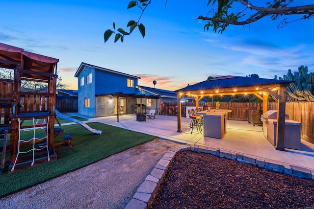 16016 Spangler Peak Rd, Ramona, CA 92065 - exterior space with a playground, outdoor dry bar, a gazebo, and a fenced backyard
