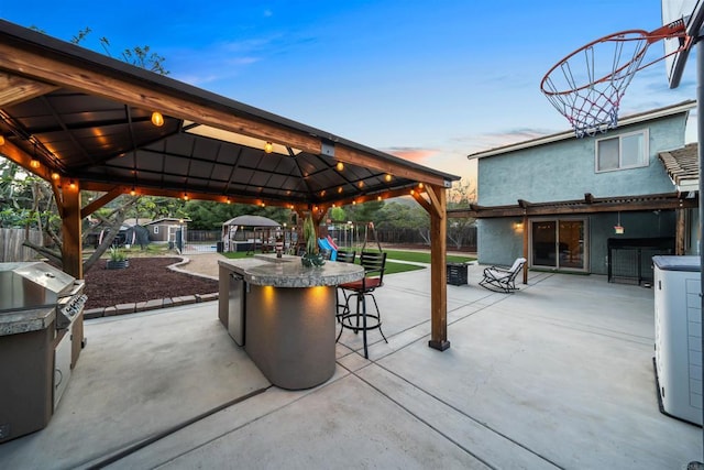 16016 Spangler Peak Rd, Ramona, CA 92065 - view of patio / terrace with grilling area, a shed, outdoor dry bar, a gazebo, and an outbuilding