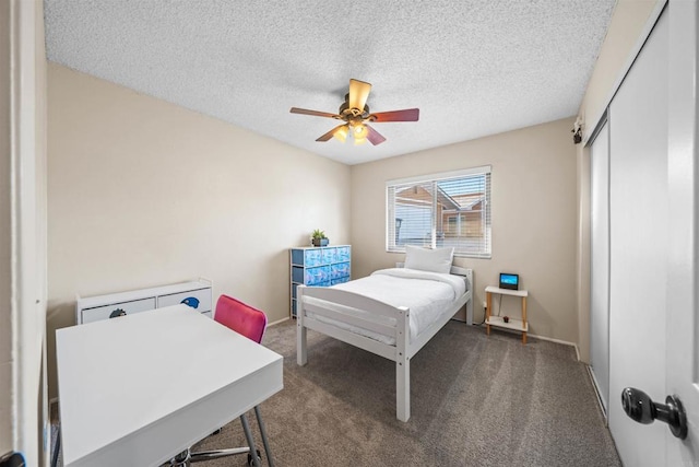 16016 Spangler Peak Rd, Ramona, CA 92065 - carpeted bedroom with a ceiling fan, a textured ceiling, and a closet