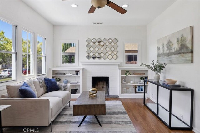 1781 Whitefield Rd, Pasadena, CA 91104 - living area with ceiling fan, visible vents, a fireplace, wood finished floors, and recessed lighting