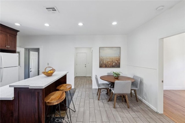 1781 Whitefield Rd, Pasadena, CA 91104 - dining room with recessed lighting, baseboards, visible vents, and light wood finished floors