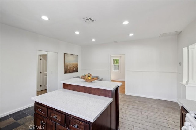 1781 Whitefield Rd, Pasadena, CA 91104 - kitchen with range, visible vents, a center island, light countertops, and recessed lighting