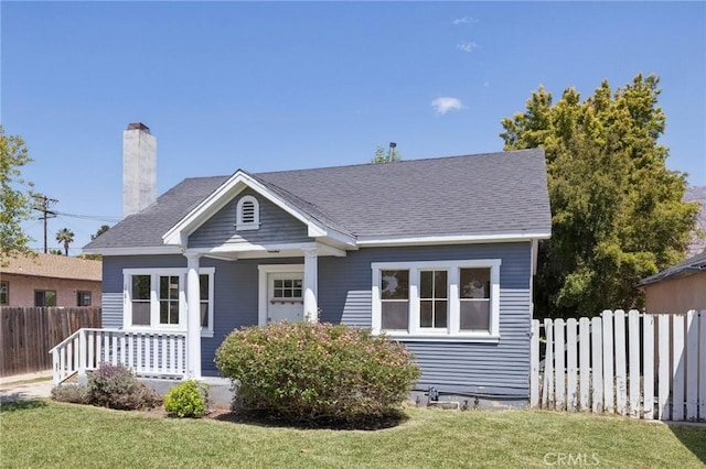 1781 Whitefield Rd, Pasadena, CA 91104 - bungalow-style house with a porch, a front lawn, fence, and a chimney