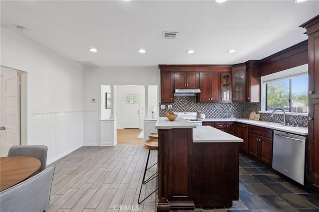 1781 Whitefield Rd, Pasadena, CA 91104 - kitchen featuring white range, visible vents, stainless steel dishwasher, a sink, and under cabinet range hood