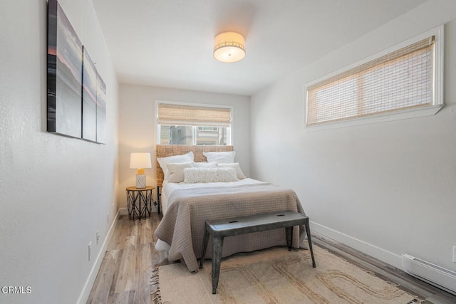 3534 Ocean Dr, Oxnard, CA 93035 - bedroom featuring baseboards and wood finished floors