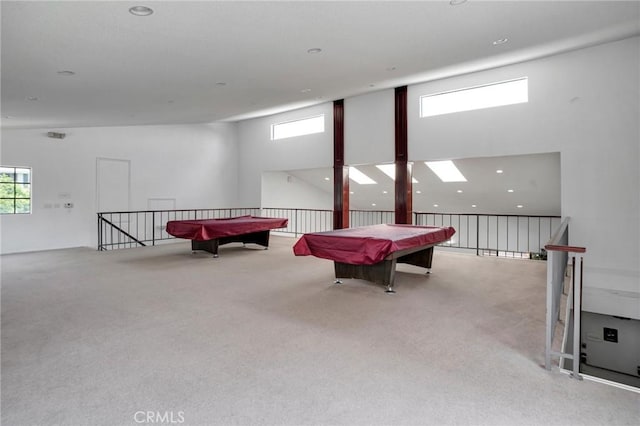 recreation room with carpet flooring, pool table, and plenty of natural light