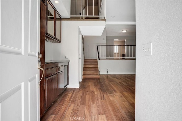 10201 Mason Ave Unit 116, Chatsworth, CA 91311 - entrance foyer featuring stairs and wood finished floors