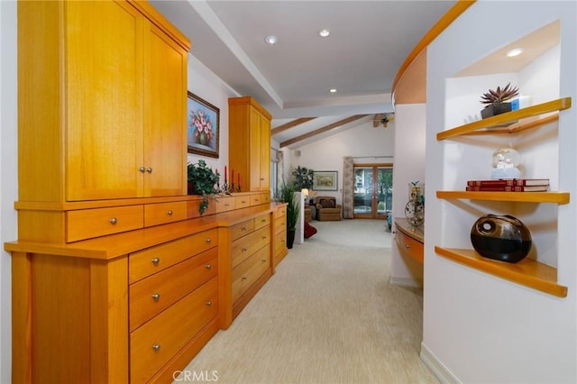 hallway featuring baseboards, lofted ceiling with beams, recessed lighting, and light colored carpet