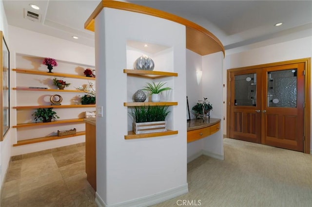 hallway with recessed lighting, baseboards, and visible vents