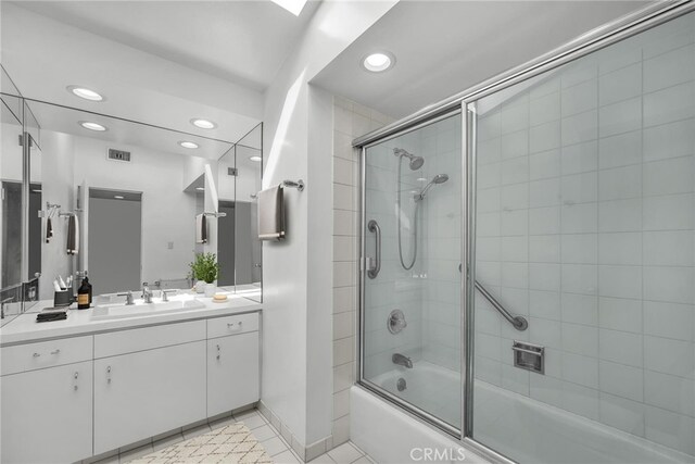 bathroom featuring recessed lighting, tile patterned floors, visible vents, and shower / bath combination with glass door
