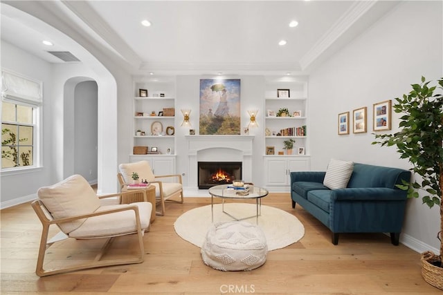 598 N Conejo School Rd, Thousand Oaks, CA 91362 - sitting room with built in features, light wood-type flooring, a warm lit fireplace, baseboards, and recessed lighting