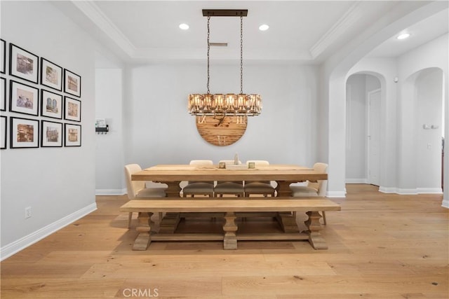 598 N Conejo School Rd, Thousand Oaks, CA 91362 - dining space with arched walkways, light wood finished floors, ornamental molding, recessed lighting, and baseboards