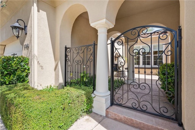 598 N Conejo School Rd, Thousand Oaks, CA 91362 - doorway to property featuring stucco siding and a gate