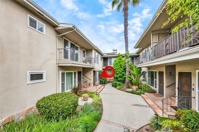 view of property's community with a patio area