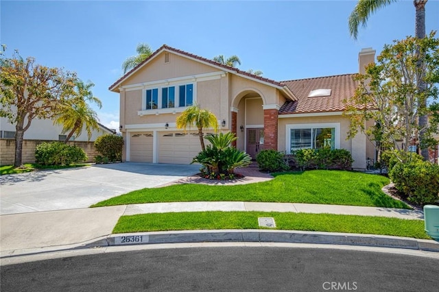 view of front of home with a garage, a front lawn, a chimney, a tiled roof, and driveway