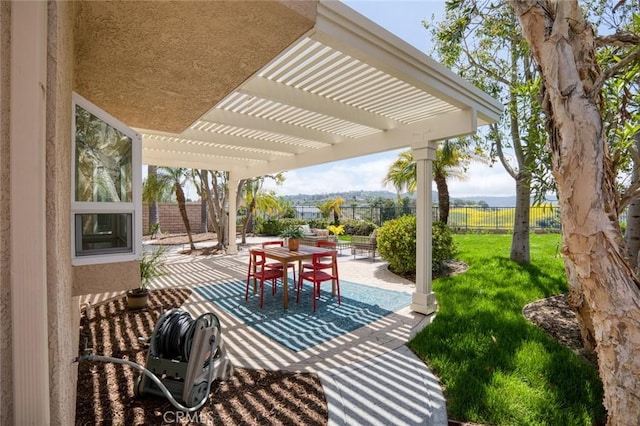 view of patio / terrace with a pergola, outdoor dining area, and a fenced backyard
