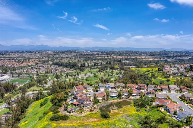 aerial view featuring a mountain view and a residential view