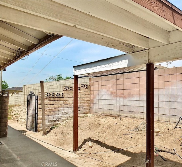 3915 Valencia Ave, San Bernardino, CA 92404 - view of patio with a fenced backyard