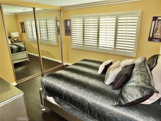 3915 Valencia Ave, San Bernardino, CA 92404 - bedroom with baseboards, ornamental molding, and a closet
