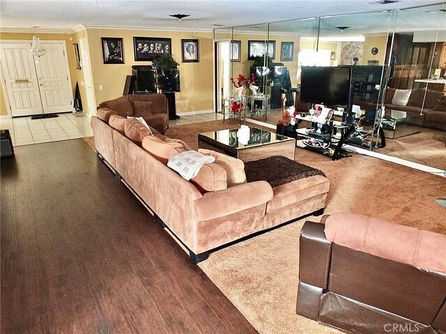 3915 Valencia Ave, San Bernardino, CA 92404 - living area with ornamental molding and wood finished floors