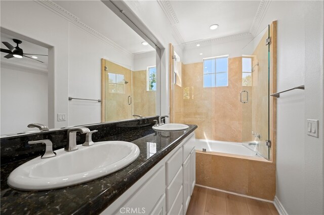 17 Calvados, Newport Coast, CA 92657 - bathroom with double vanity, a sink, enclosed tub / shower combo, and ornamental molding